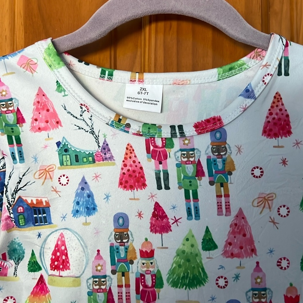 New without tags. Girls size 6/7 Nutctacker dress made in the USA